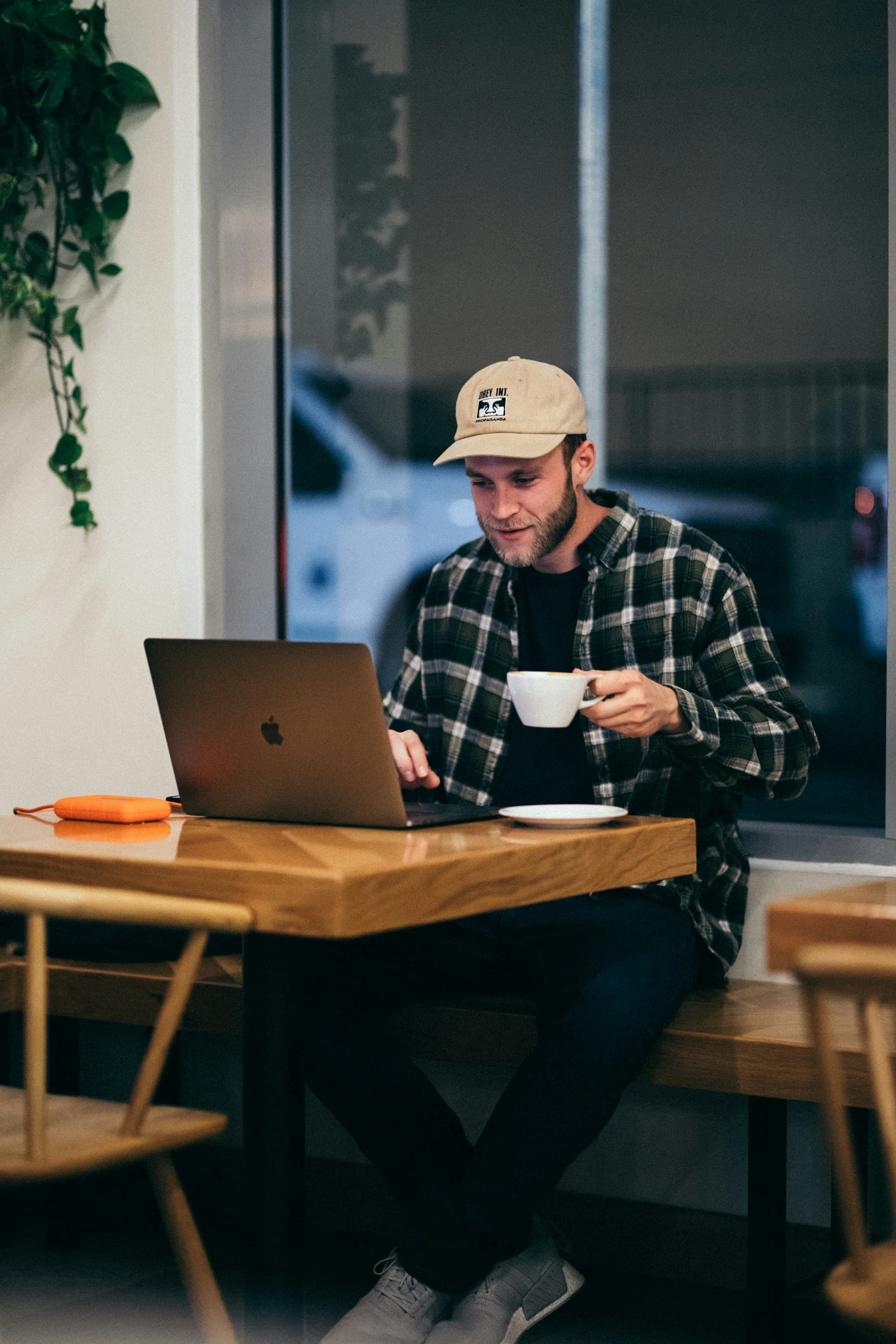 man with macbook laptop